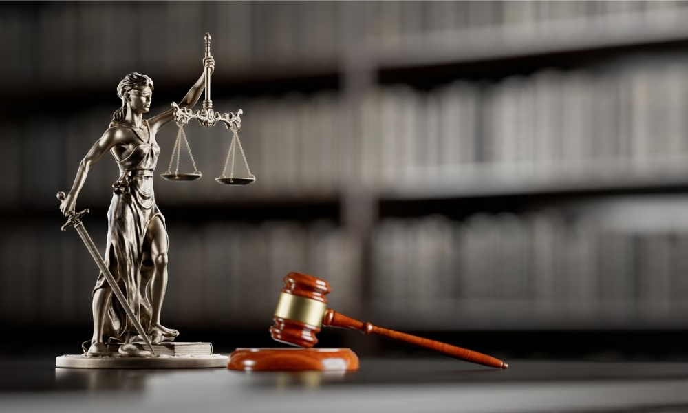 Legal desk with scales and gavel